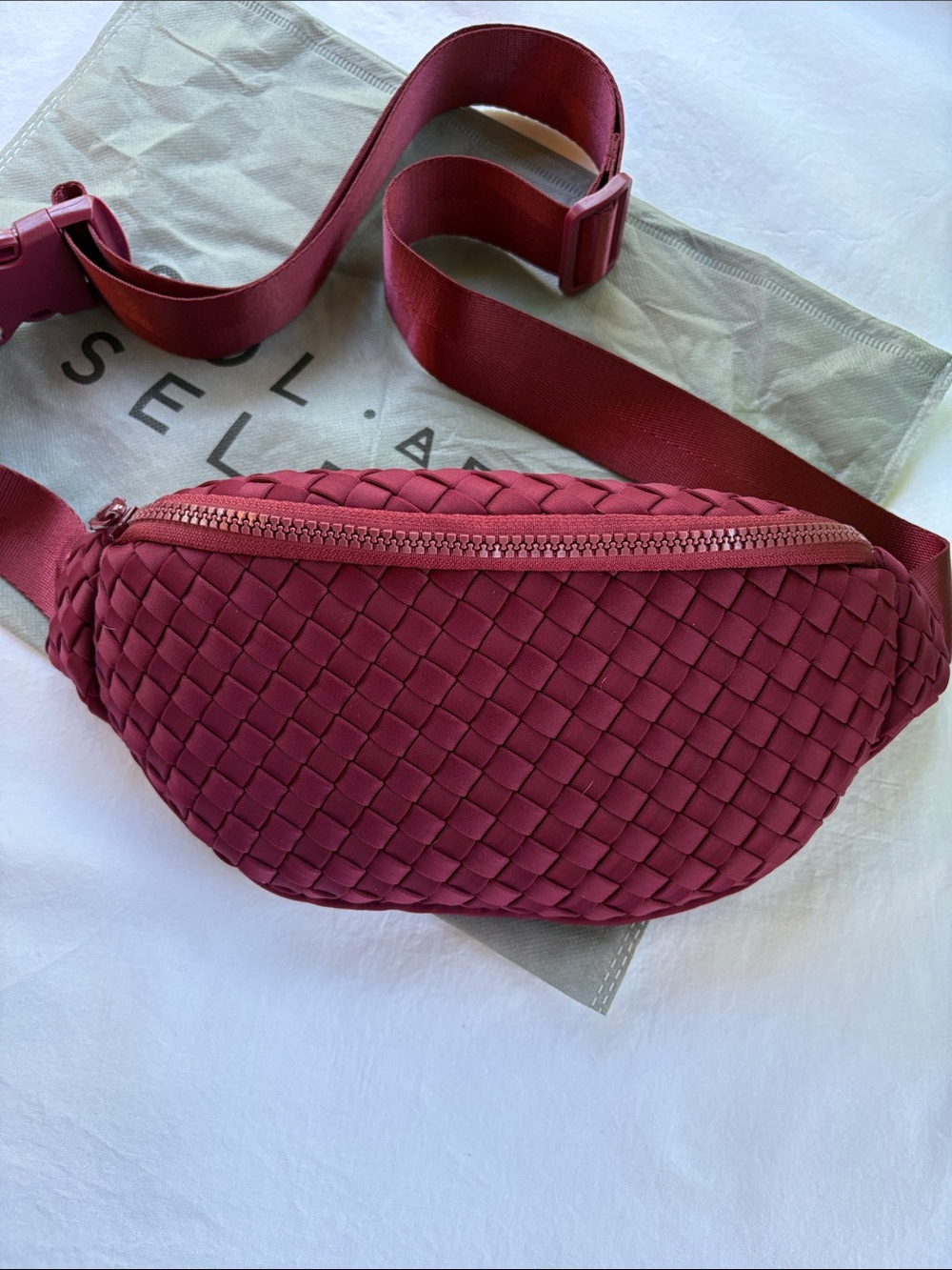Sol and Selene Aim High woven belt bag in Wine